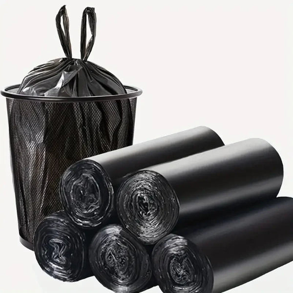 Black trash bags with a trash can on a white background