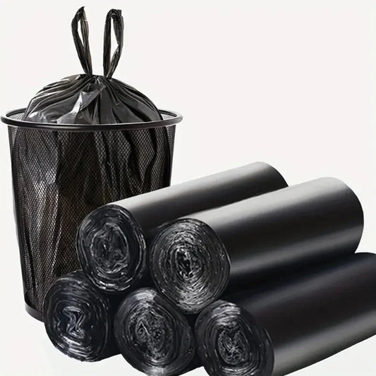 Black trash bags with a trash can on a white background