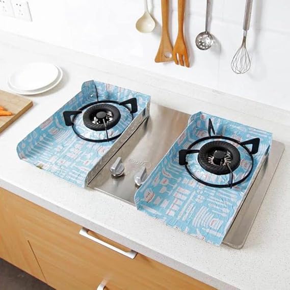 Two gas burners with blue flame pattern covers on a kitchen counter.