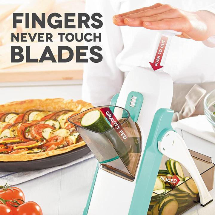 Vegetable slicer with text 'Fingers Never Touch Blades' on a kitchen background.