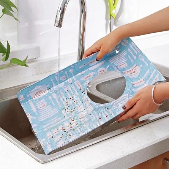 Person using a blue cutting board with a sink design to clean a knife over a sink.