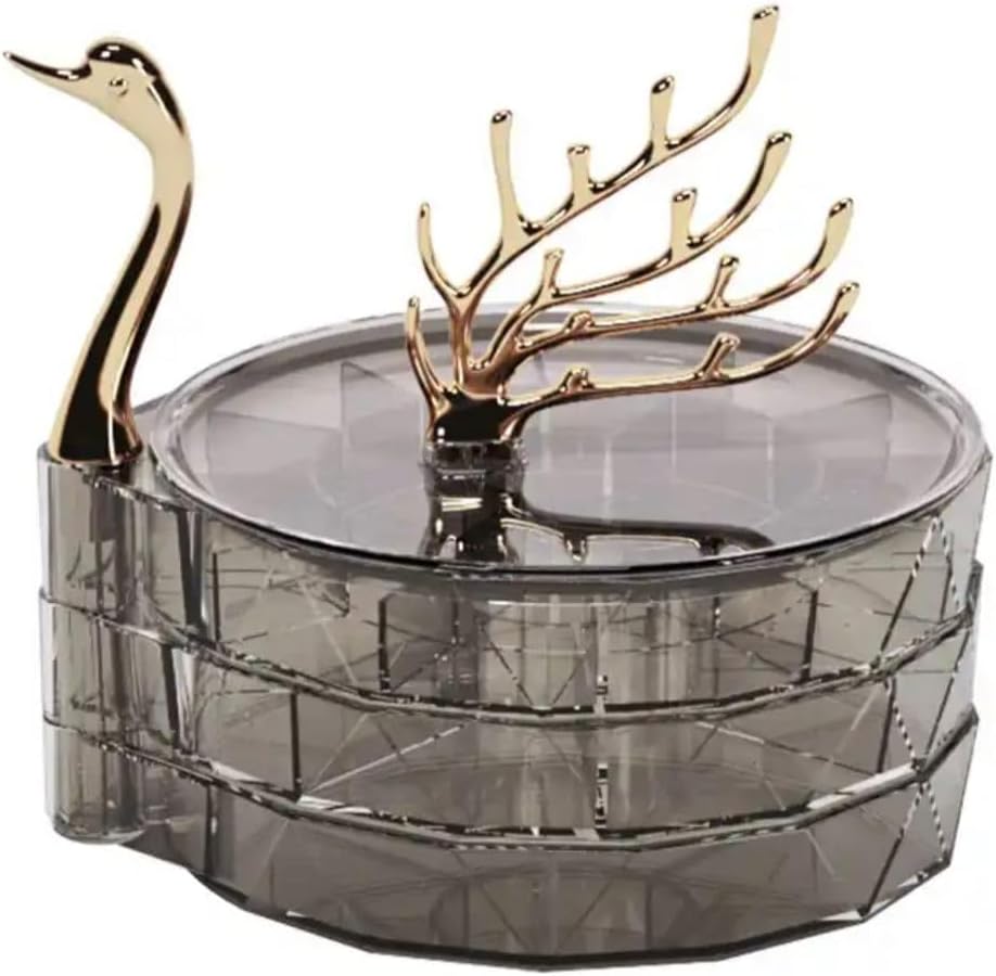 Decorative bowl with gold swan and deer antlers on a white background
