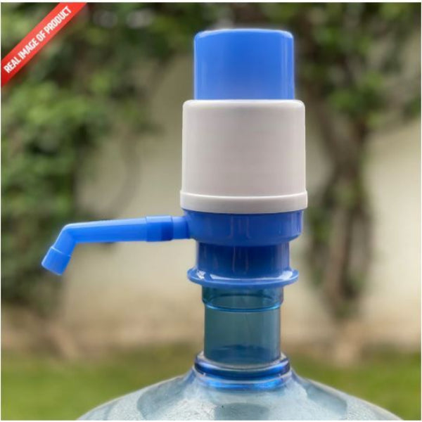 Blue and white manual water pump on a water bottle with a blurred outdoor background