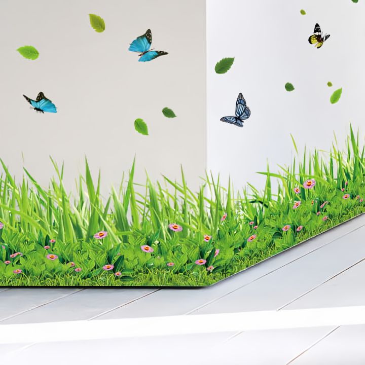 Decorative border with grass, flowers, and butterflies on a white background