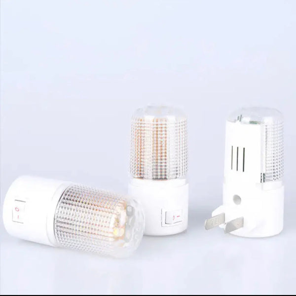 Three smart light bulb sockets on a white background