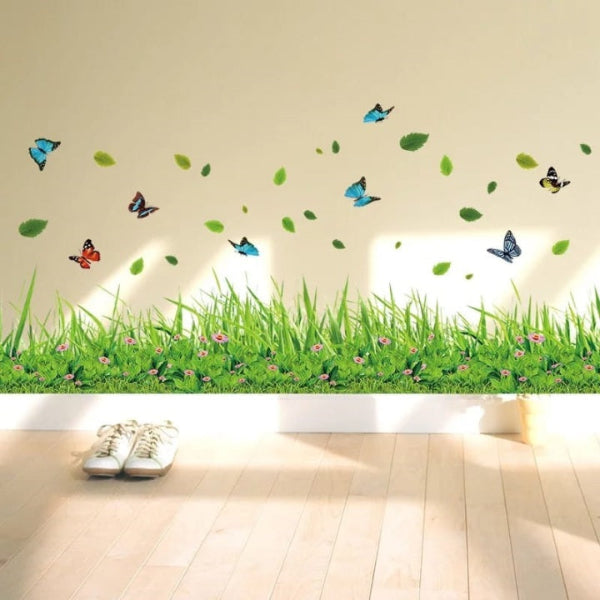 Wall decal of grass and butterflies on a wall