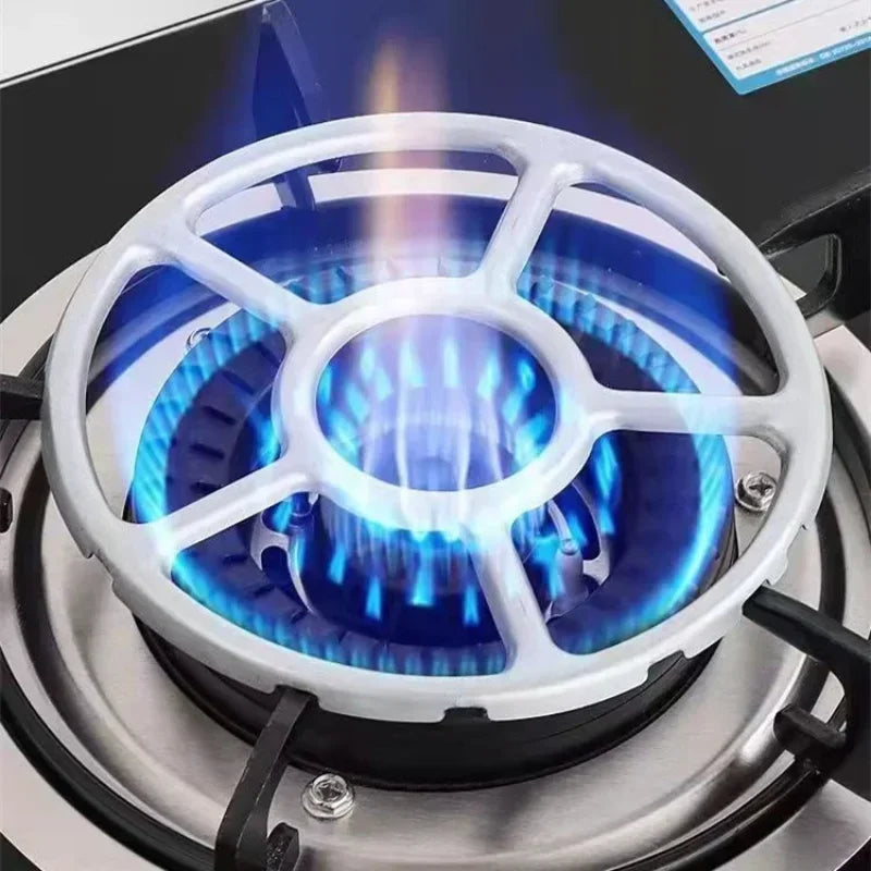 Close-up of a gas stove burner with blue flames