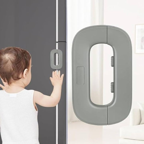 Child trying to open a door with a baby safety lock on it.