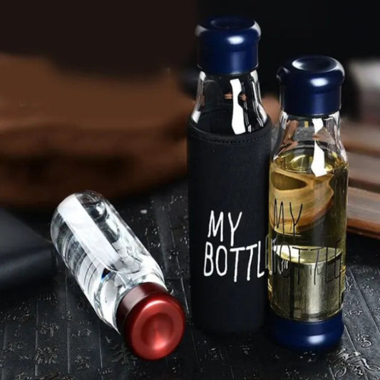 Three bottles with labels 'MY BOTTLE' on a dark surface