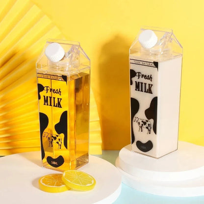 Two milk carton-shaped bottles with 'Fresh Milk' text on a yellow background