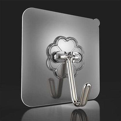 Metallic wall hook on a reflective black surface