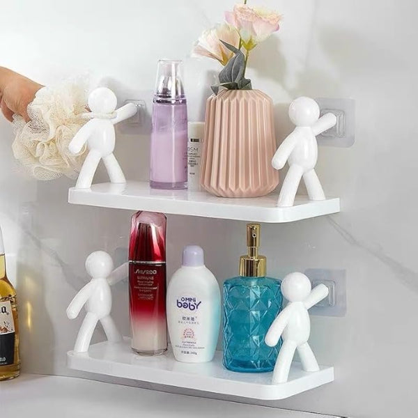 Shelf with various bottles and decorative figures on a white background