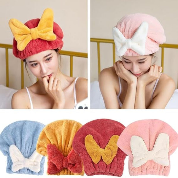 Two women wearing colorful towel hats with bow accents, surrounded by the same hats in different colors.