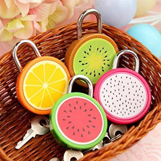 Colorful fruit-shaped keychains in a wicker basket with flowers in the background