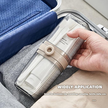 Hand holding a travel-sized toiletry set with a suitcase in the background