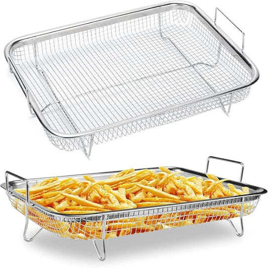 Stainless steel deep fryer basket with French fries on a white background