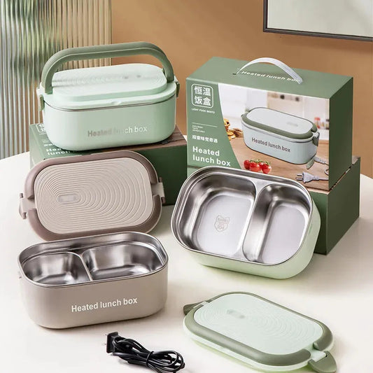 Heated lunch box with packaging on a white surface
