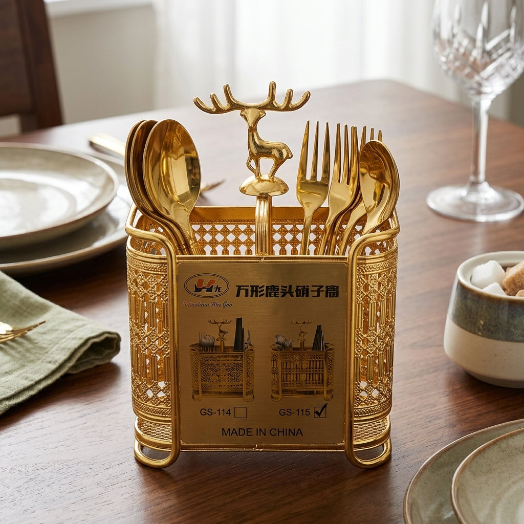 Gold cutlery set with deer design holder on a dining table
