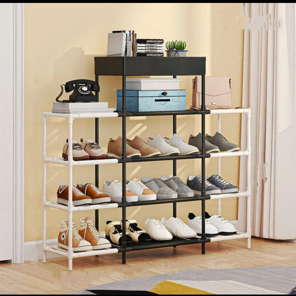 Shoe rack with various shoes on shelves against a yellow wall.