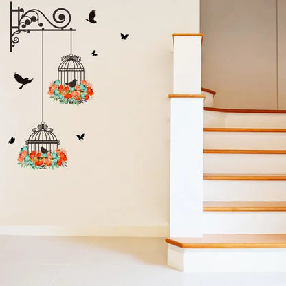 Decorative wall stickers of birdcages with floral designs on a staircase wall.
