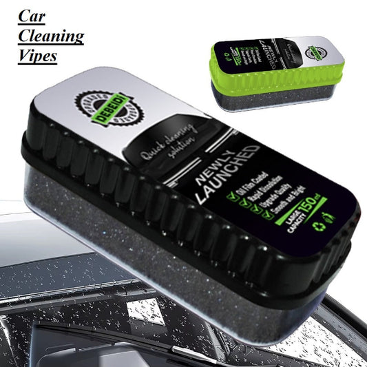 Car cleaning wipe with packaging on a car window