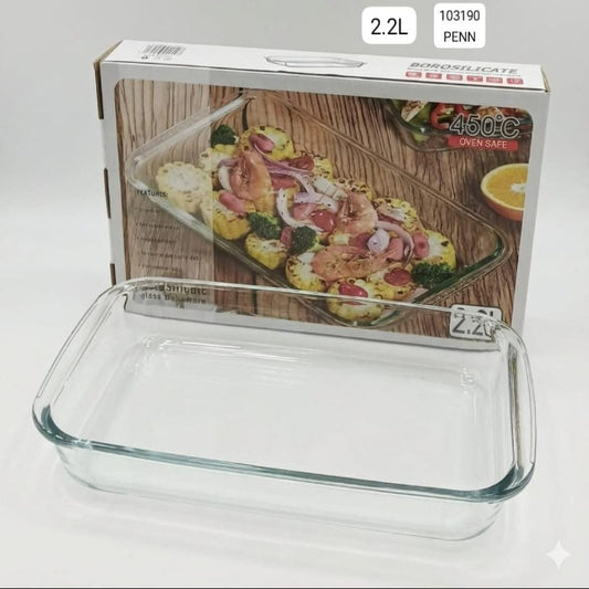 Clear glass baking dish with a wooden cutting board and food image on the packaging.