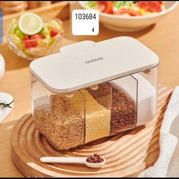 Spice container with compartments on a wooden surface, showing different types of grains.