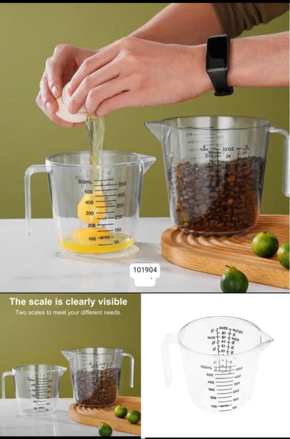 Person measuring ingredients with a digital scale, showing close-up of scale and measuring cups.