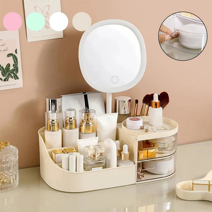 Cosmetic organizer with various products on a desk, featuring a round mirror with lights.